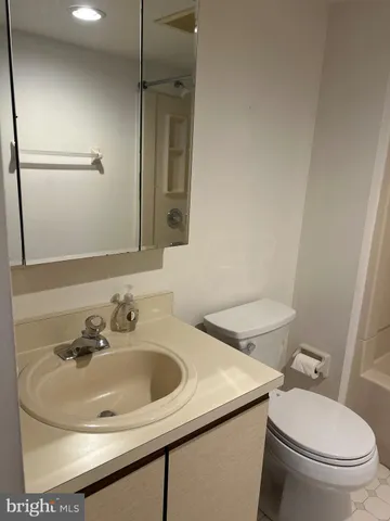 a bathroom with a mirror