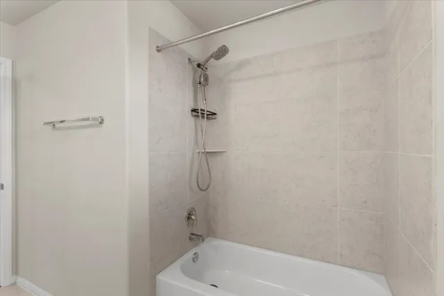 a bathroom with a sink toilet and a mirror