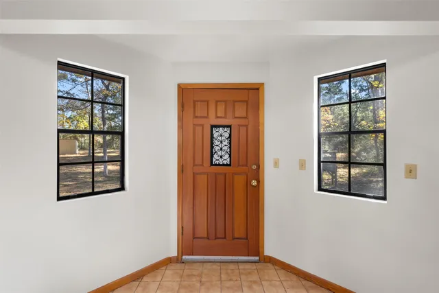 a kitchen with stainless steel appliances a stove a sink and a refrigerator