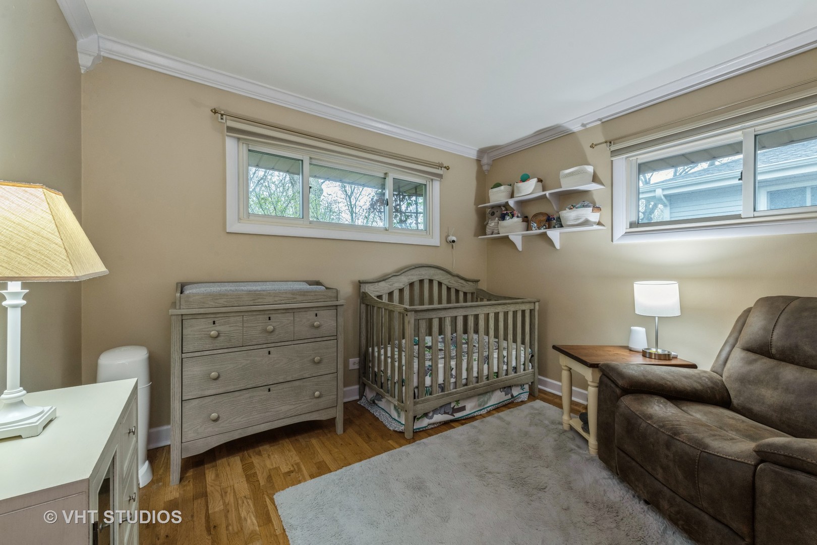 24 Crescent Road Lake Zurich, IL 60047 - Photo 9 of 11 a bedroom with a bed and a window
