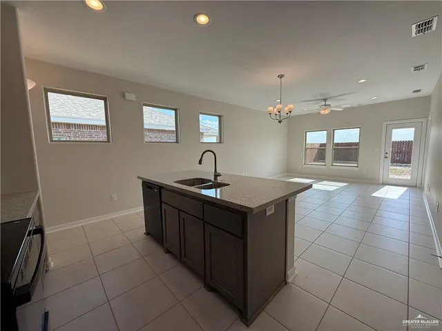 a view of backyard of a house