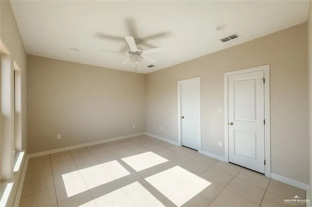 a kitchen with stainless steel appliances granite countertop a sink and a stove