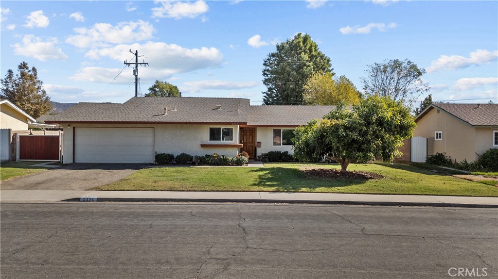 2324 Workman Avenue Simi Valley, CA 93063 - Photo 1 of 1 a front view of a house with a yard and garage
