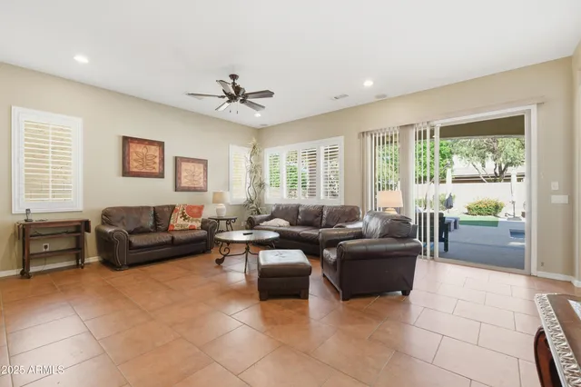 a bathroom with a double vanity sink toilet mirror and shower
