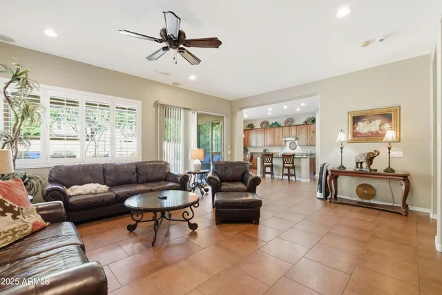 a view of a patio with a table and chairs