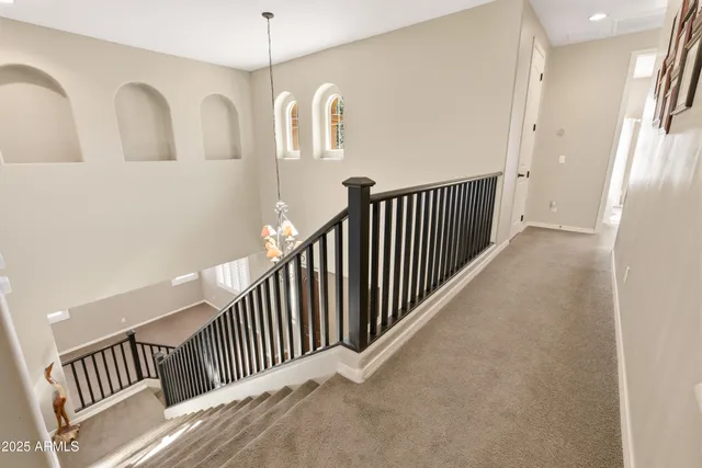 a view of a house with a yard porch and sitting area