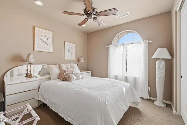an aerial view of a house with a swimming pool yard and outdoor seating