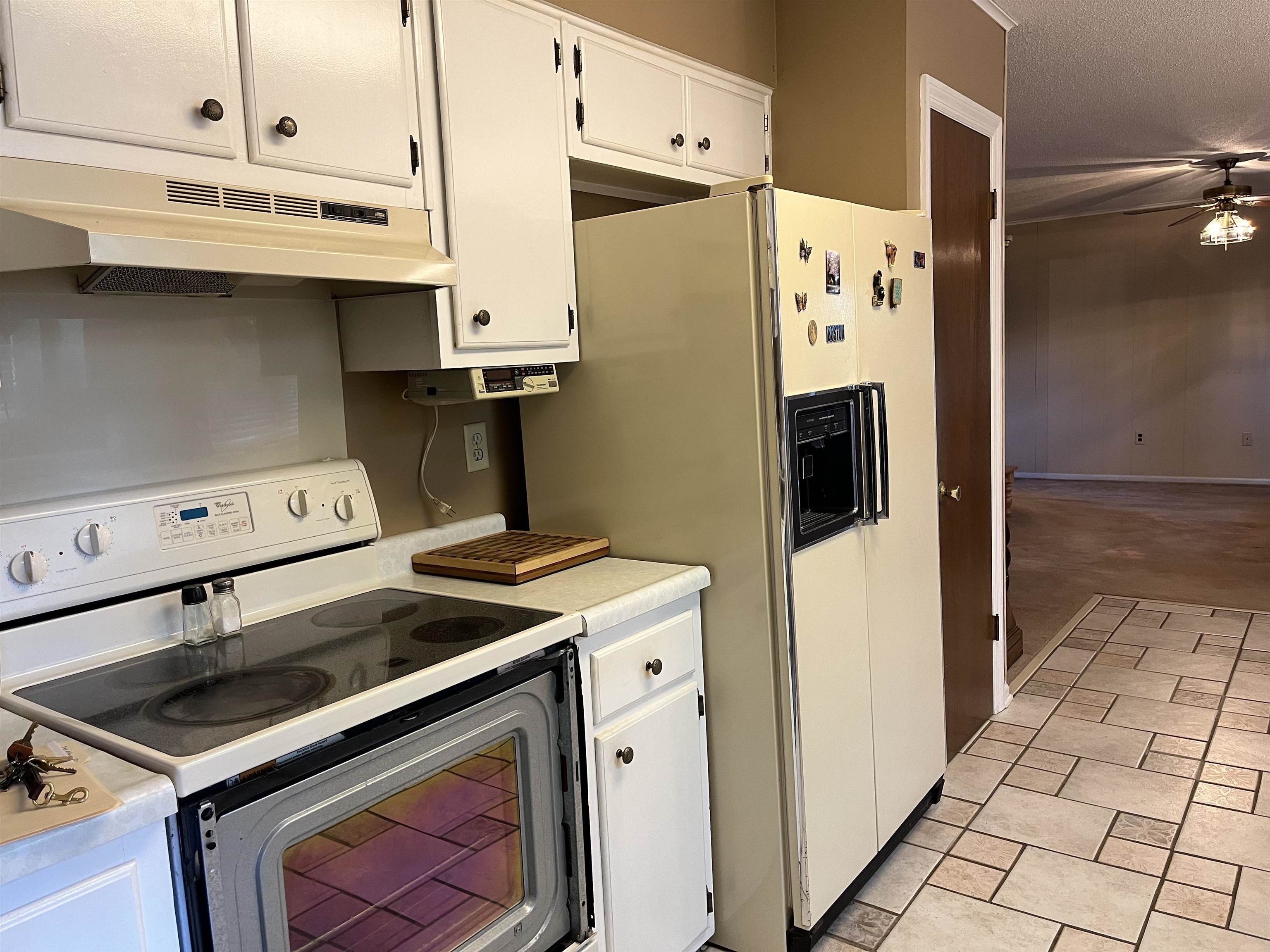 3045 Altruria Road Bartlett, TN 38134 - Photo 12 of 24 a kitchen with stainless steel appliances a refrigerator a stove and a refrigerator