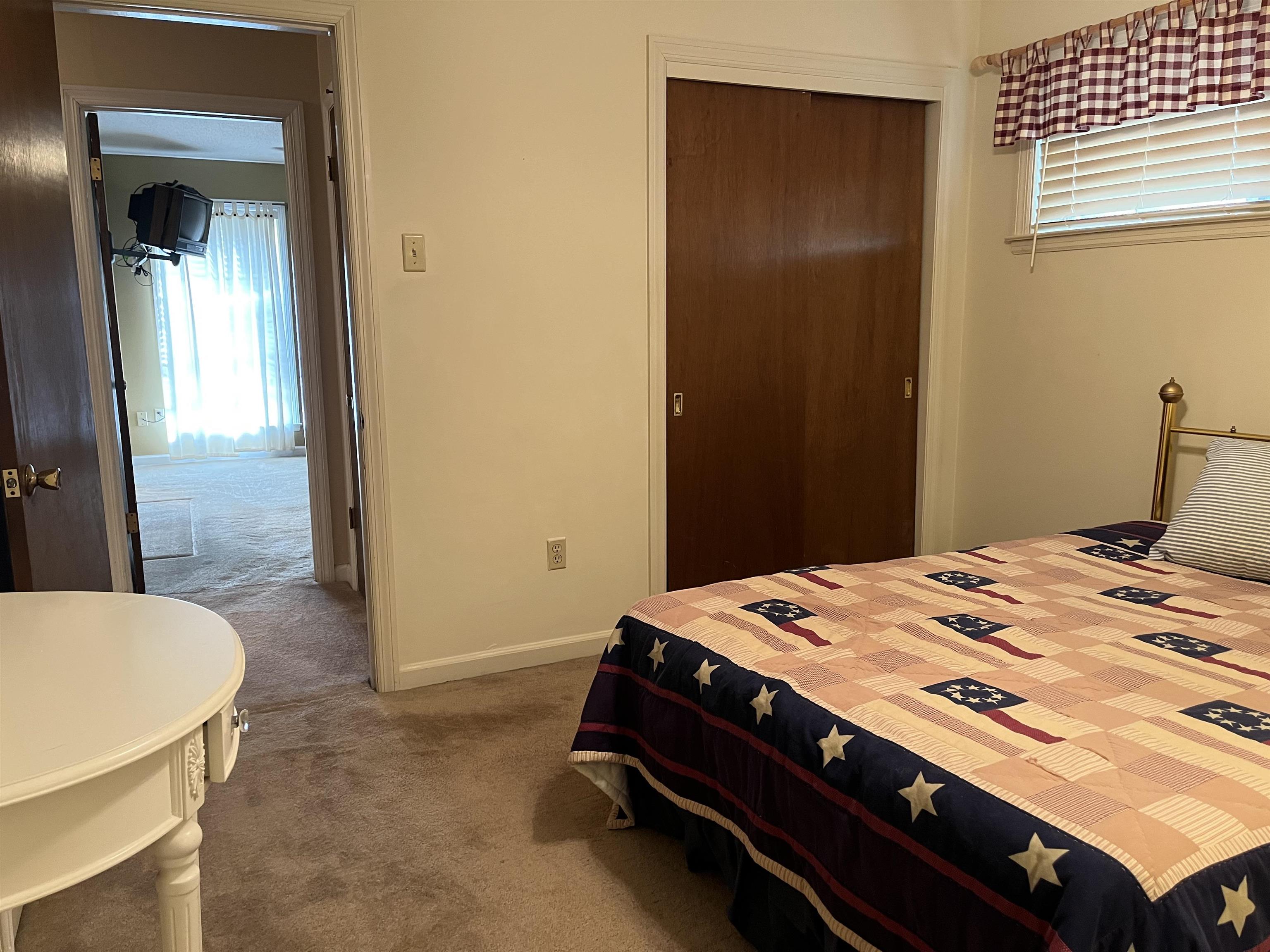 3045 Altruria Road Bartlett, TN 38134 - Photo 17 of 24 a bedroom with a bed and a dresser