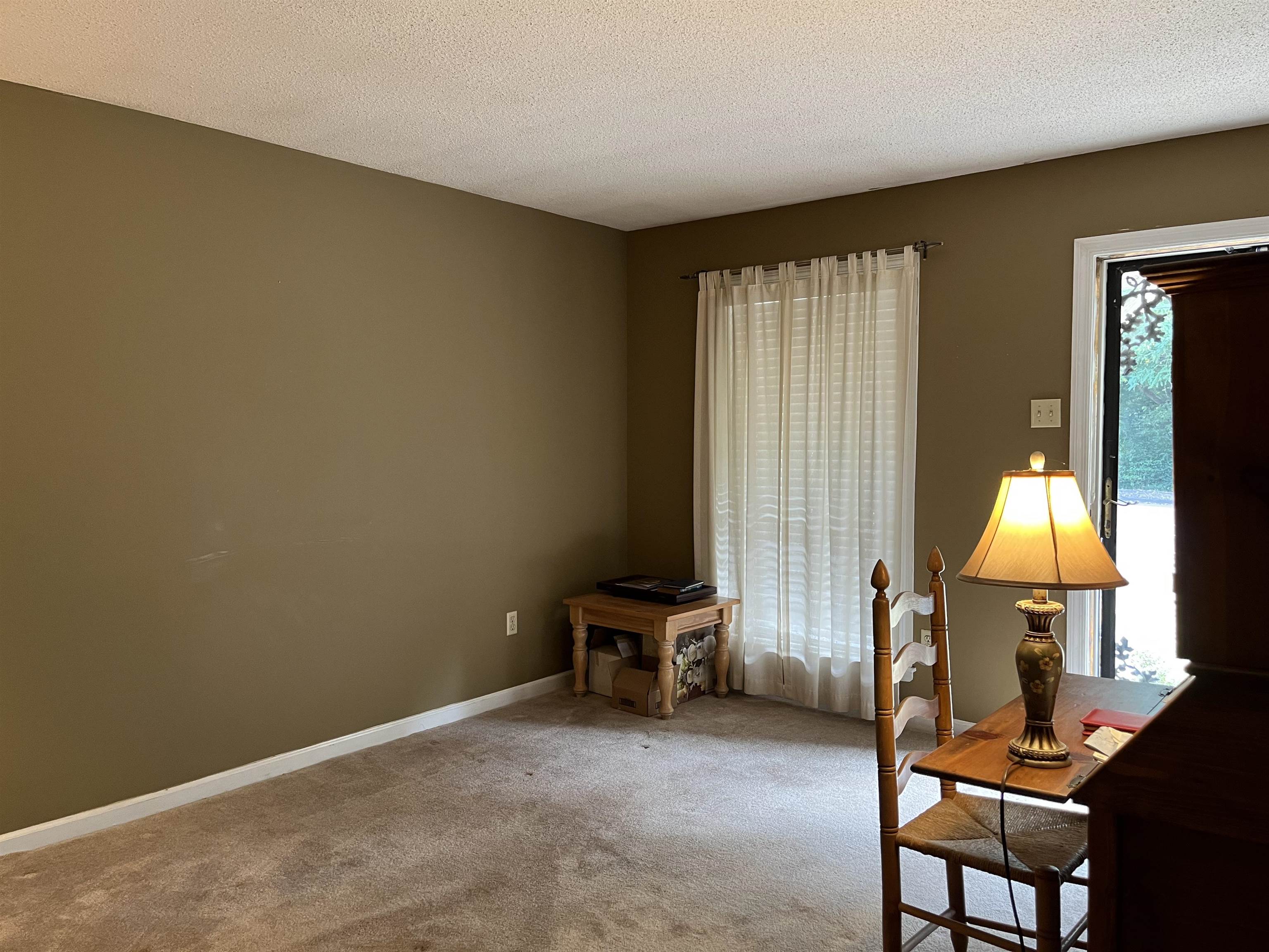 3045 Altruria Road Bartlett, TN 38134 - Photo 7 of 24 a view of a room with gym equipment and a window