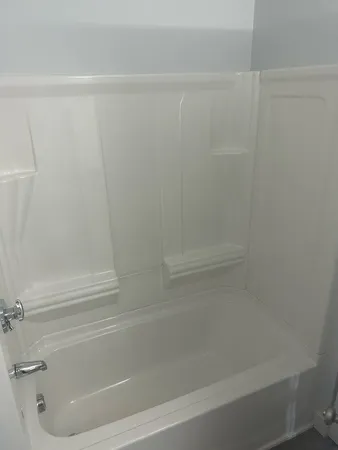 a bathroom with a bathtub