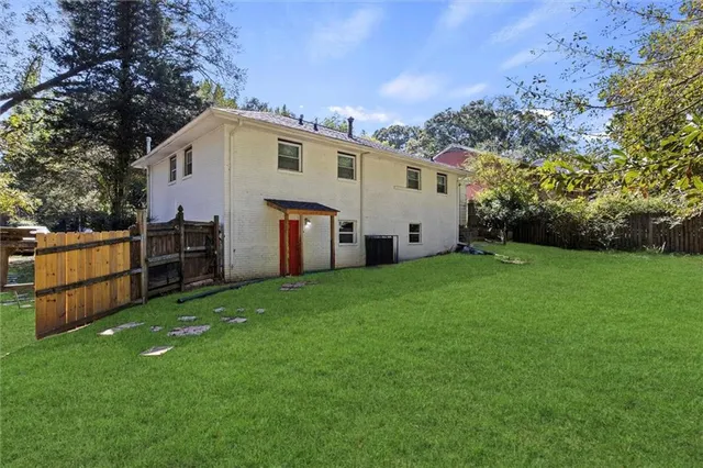 a view of a backyard with a garden