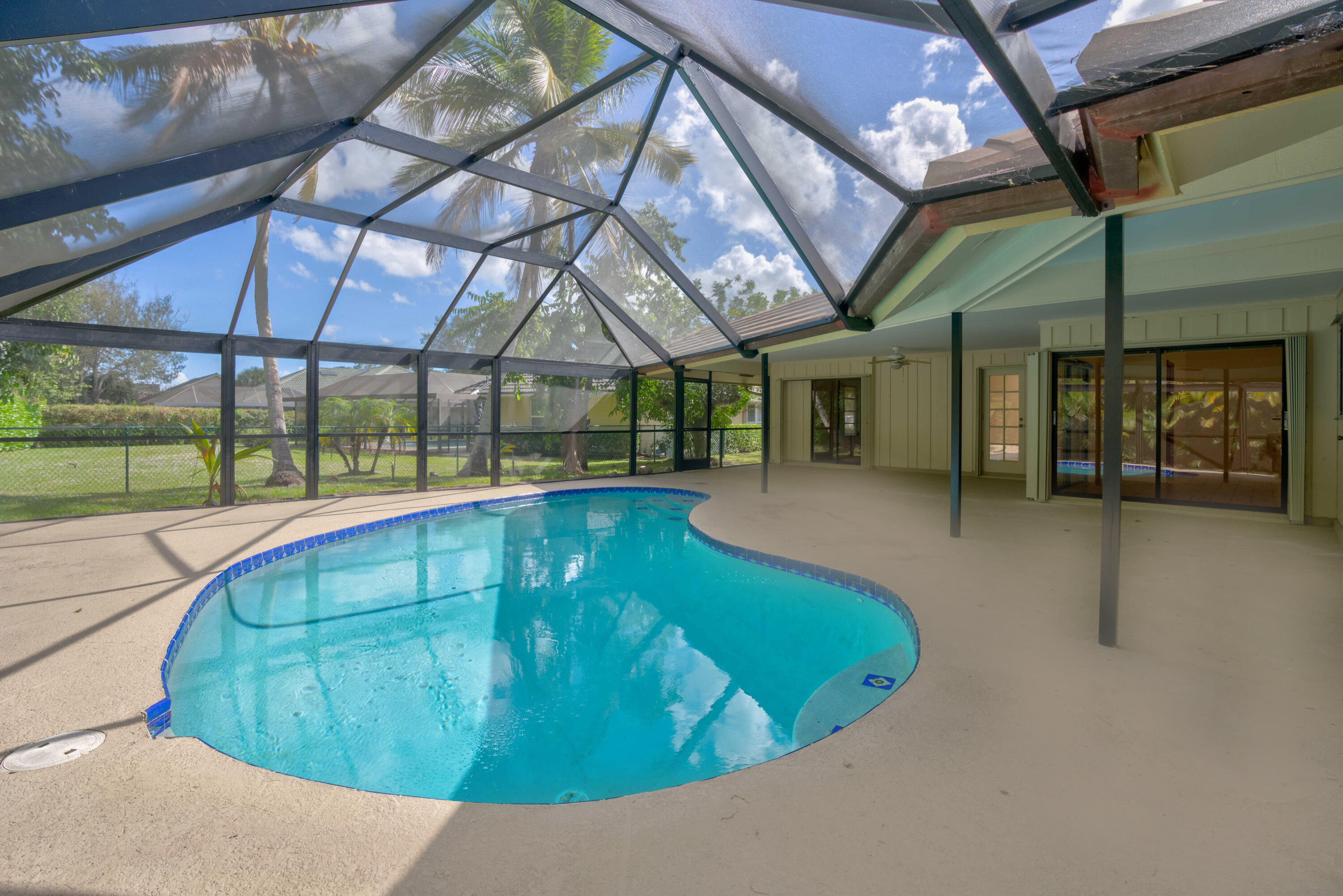 15 Dunbar Road Palm Beach Gardens, FL 33418 - Photo 39 of 45 Enclosed Pool/Patio Area