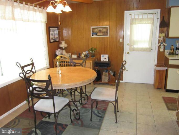 604 Lowander Lane Silver Spring, MD 20901 - Photo 22 of 30 Large eat-in area in kitchen with door to carport