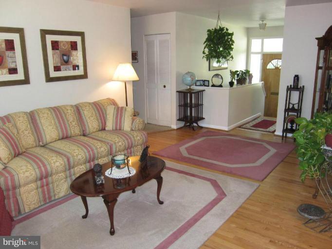 604 Lowander Lane Silver Spring, MD 20901 - Photo 7 of 30 Entrance and living room with hardwoods