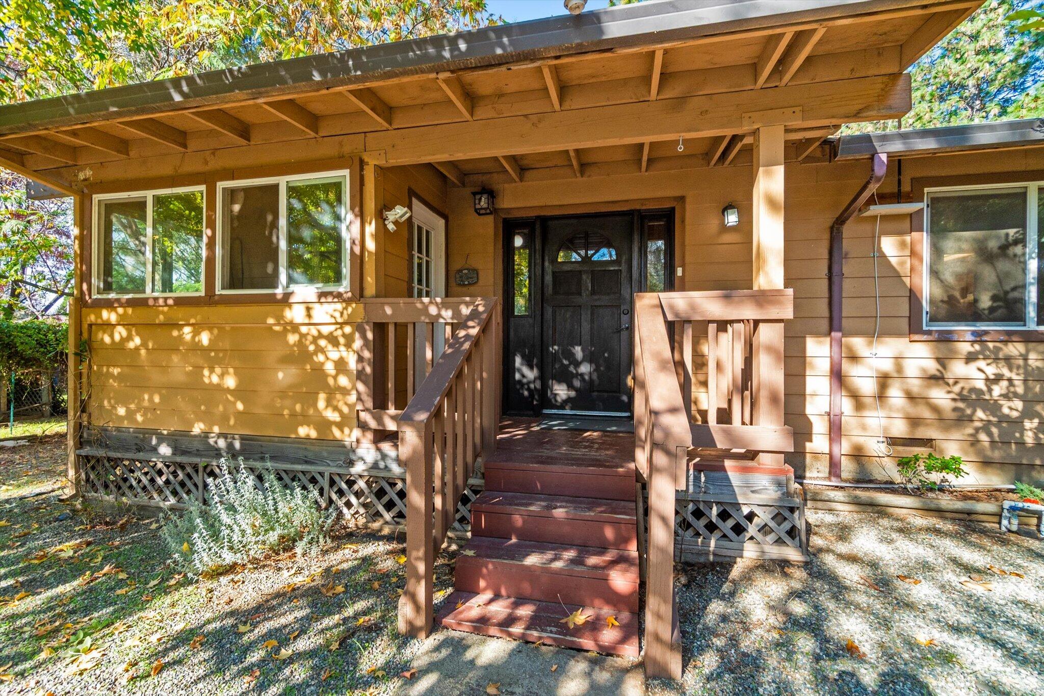 a view of a house with large windows