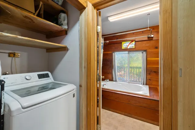 a utility room with dryer and washer