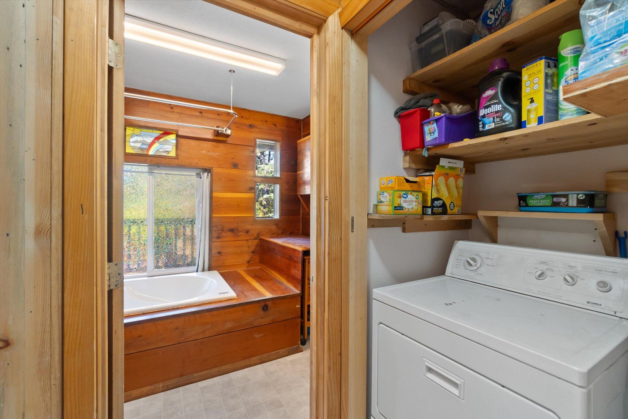 28449 Whippoorwill Circle Shingletown, CA 96088 - Photo 22 of 52 a utility room with dryer and washer