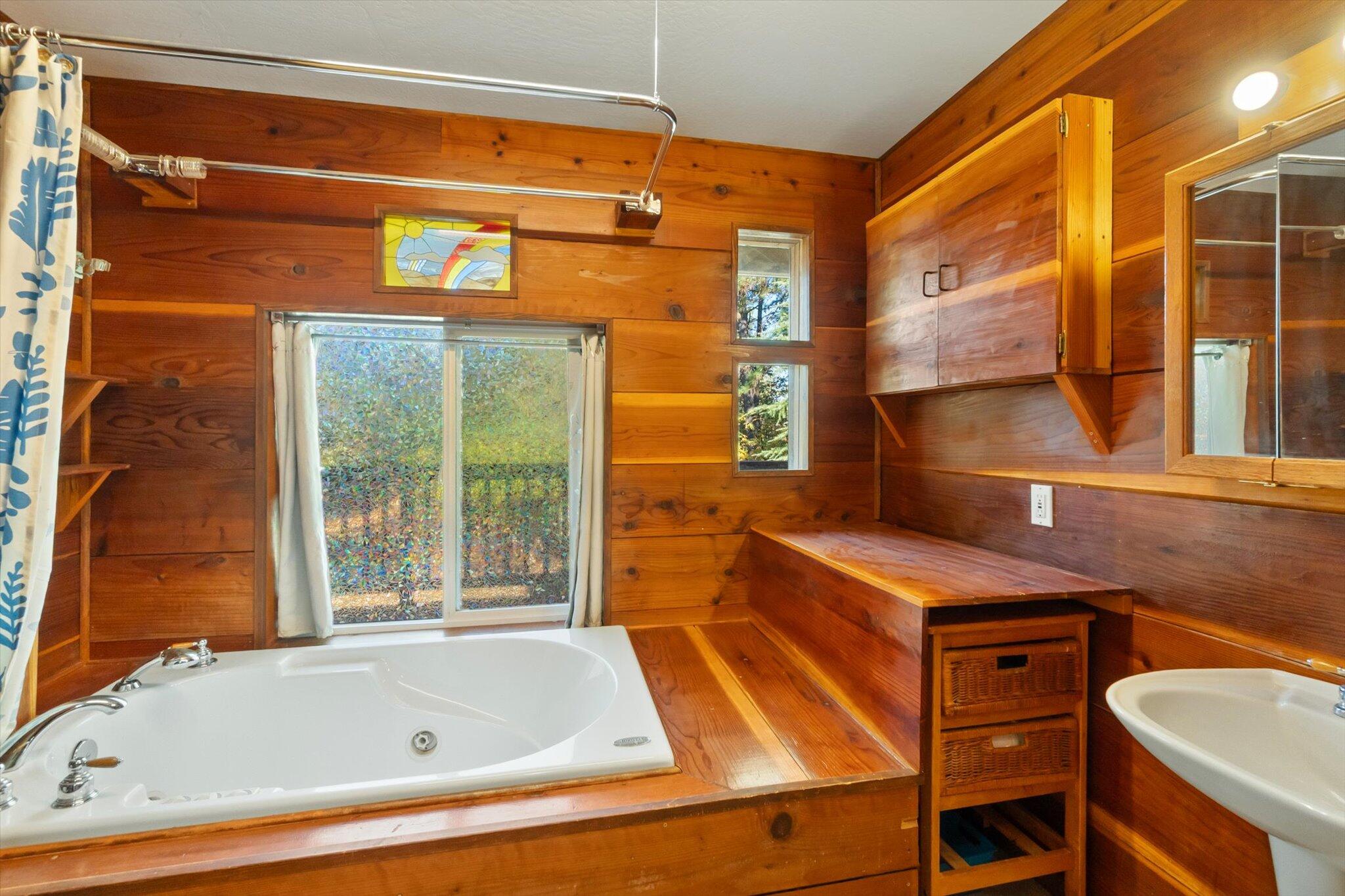 28449 Whippoorwill Circle Shingletown, CA 96088 - Photo 23 of 52 a bathroom with a bathtub and a shower