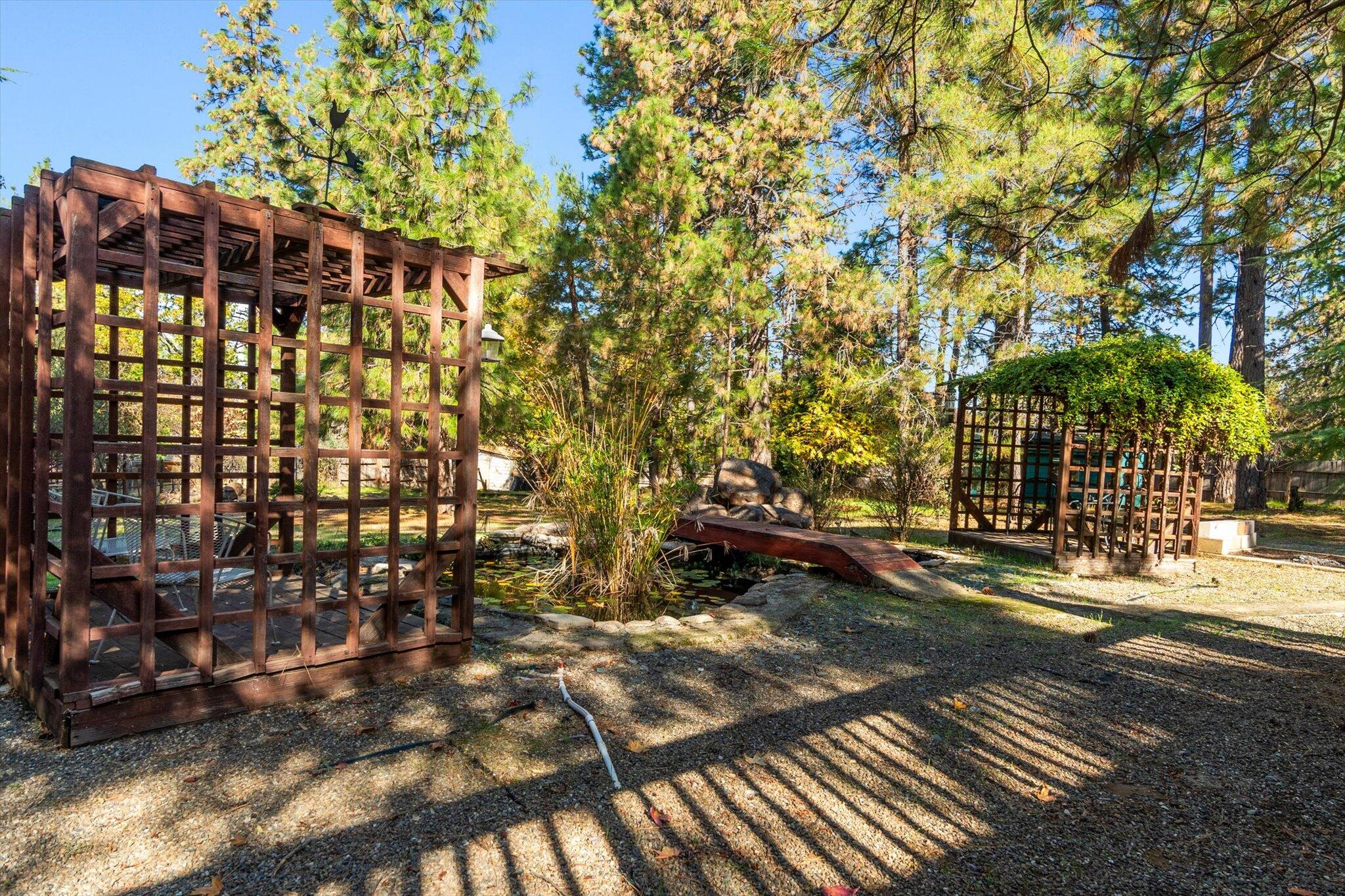 28449 Whippoorwill Circle Shingletown, CA 96088 - Photo 30 of 52 a view of a street with houses
