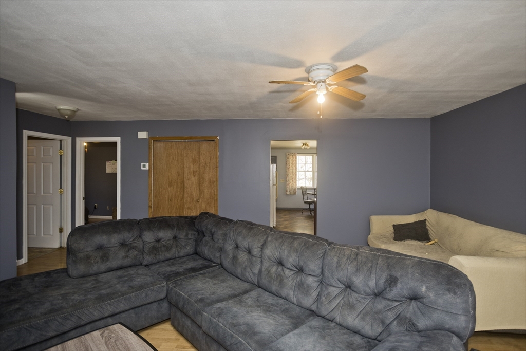 300 Middlefield Road Chester, MA 01011 - Photo 26 of 40 a living room with furniture and window