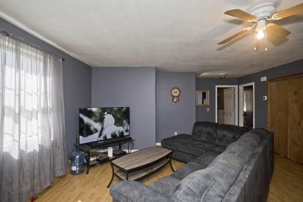 300 Middlefield Road Chester, MA 01011 - Photo 27 of 40 a living room with furniture and a flat screen tv