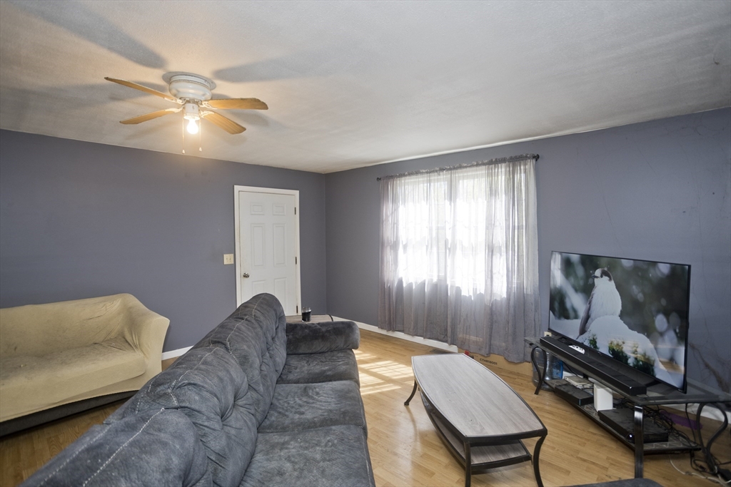 300 Middlefield Road Chester, MA 01011 - Photo 28 of 40 a living room with furniture and a window