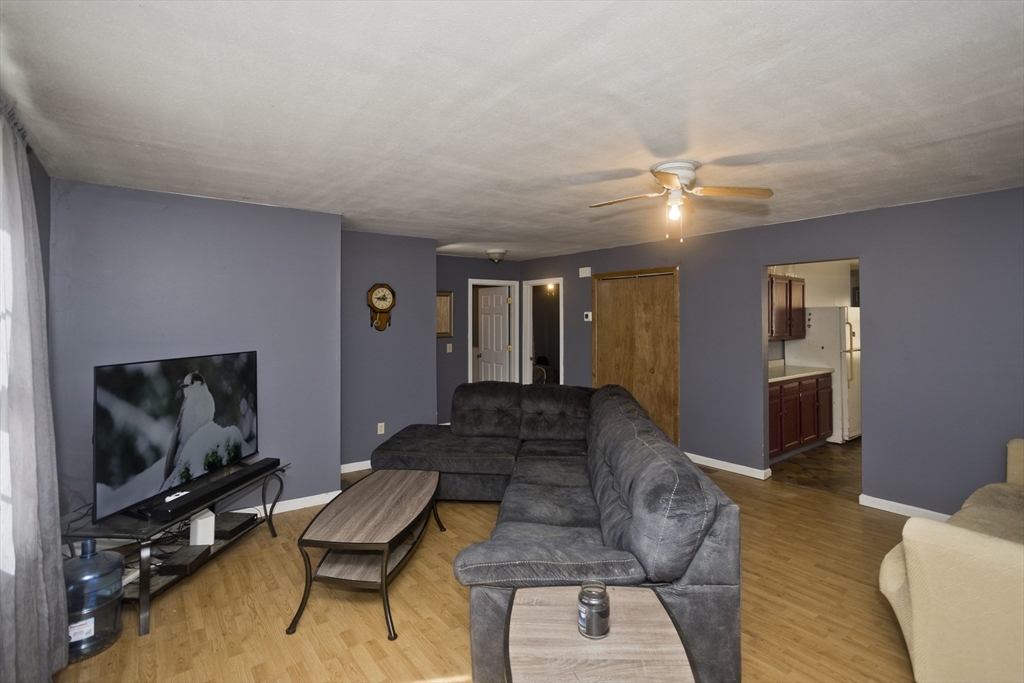 300 Middlefield Road Chester, MA 01011 - Photo 29 of 40 a living room with furniture and a flat screen tv