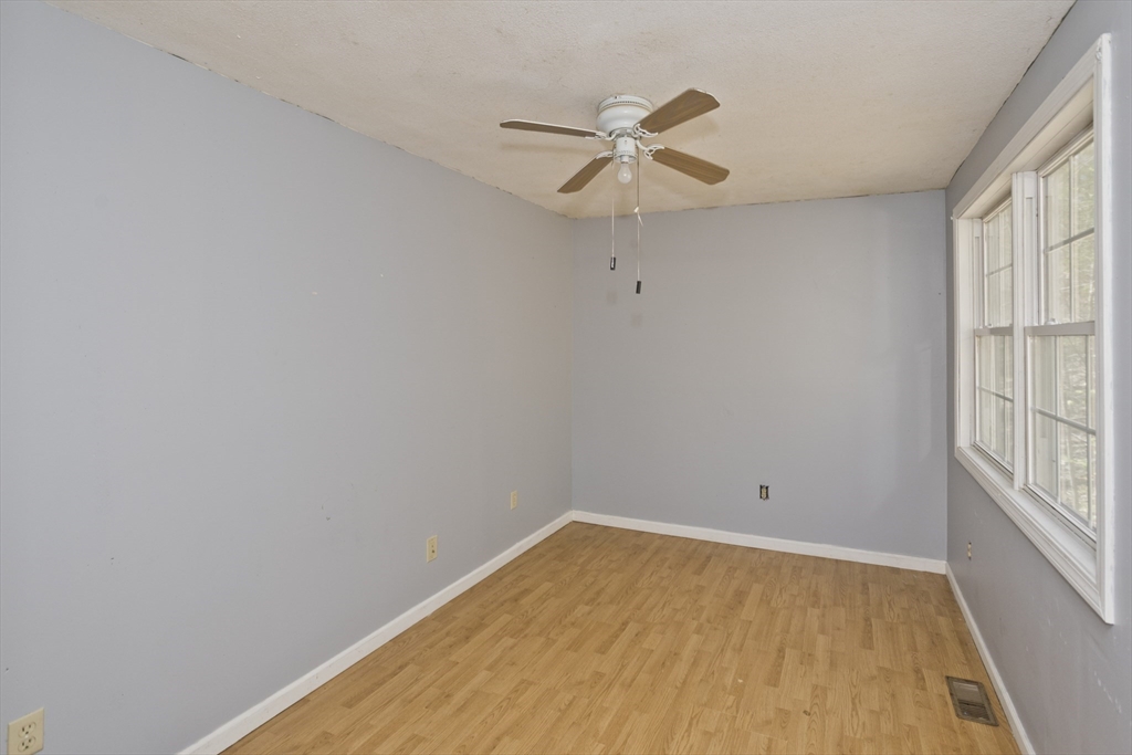 300 Middlefield Road Chester, MA 01011 - Photo 38 of 40 wooden floor in an empty room with a window