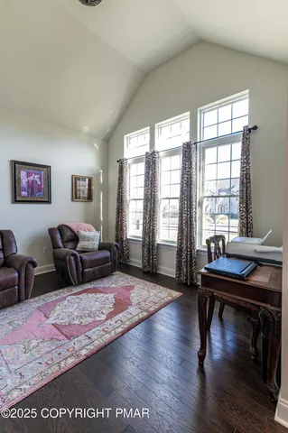 a view of entryway with wooden floor