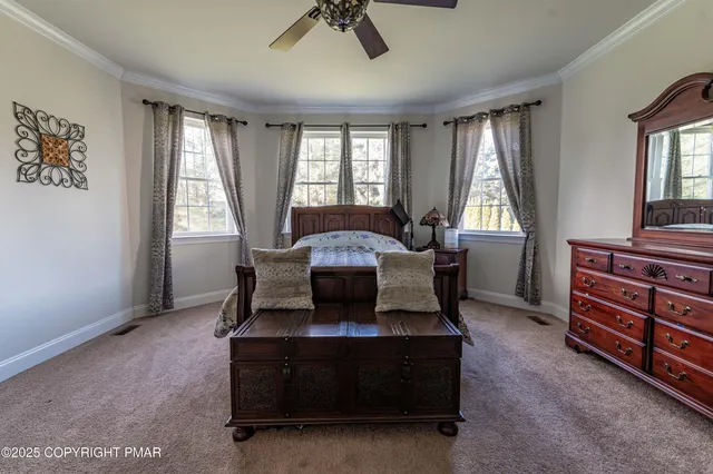 a bathroom with a tub a sink and a shower