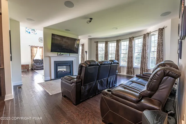 a kitchen with lots of counter space and wooden floor