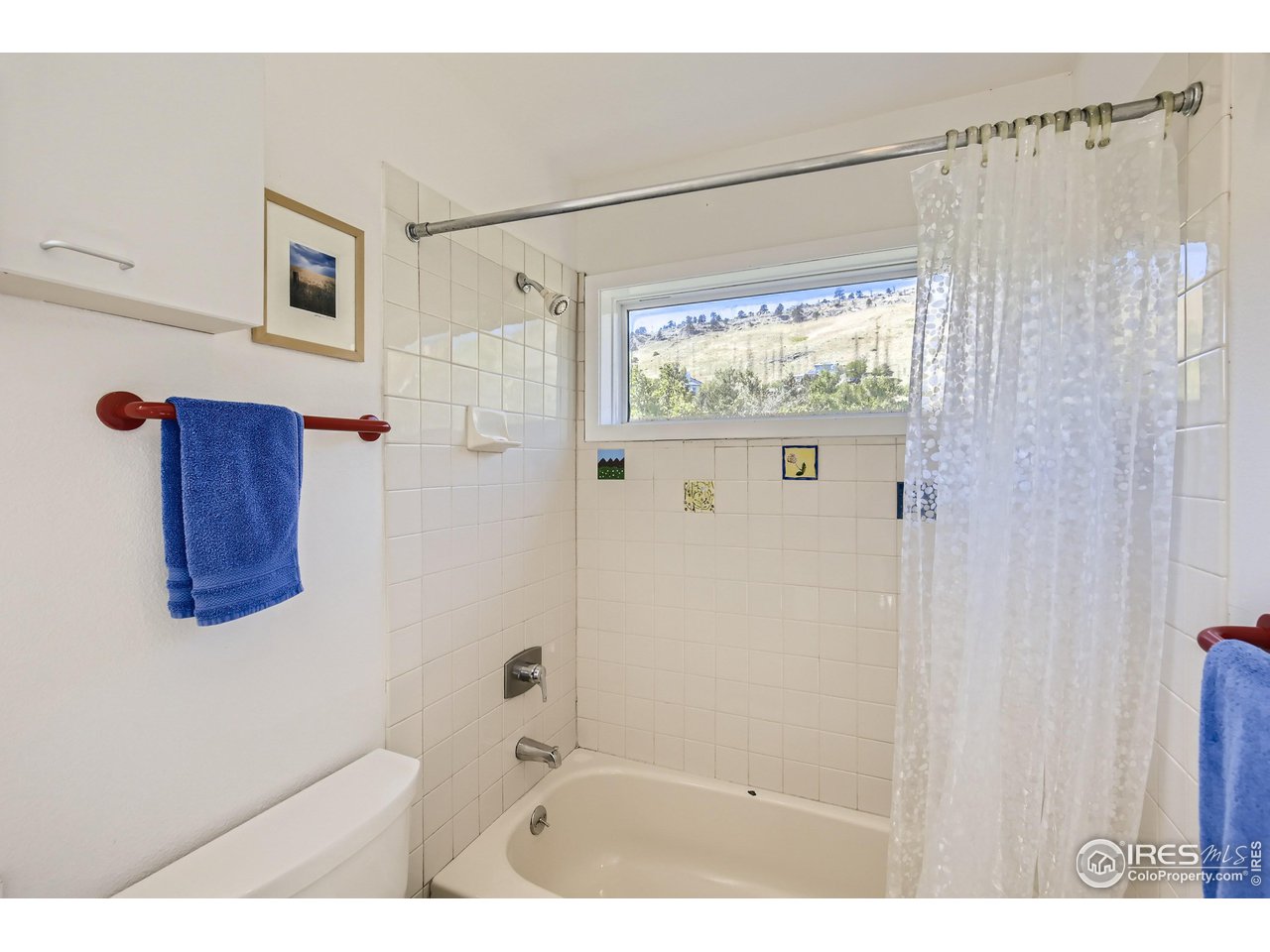 365 Quail Circle Boulder, CO 80304 - Photo 19 of 29 a bathroom with a shower and a sink