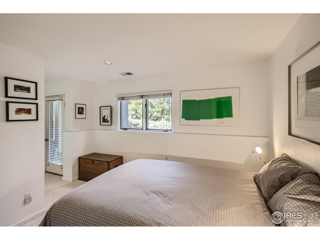 365 Quail Circle Boulder, CO 80304 - Photo 23 of 29 a bedroom with a bed and a window