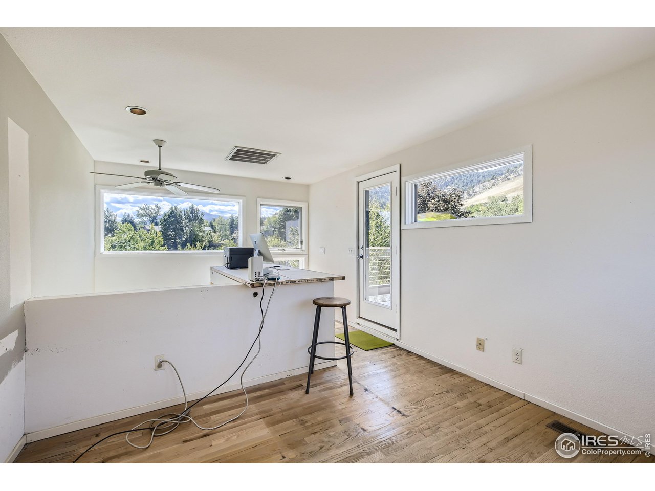 365 Quail Circle Boulder, CO 80304 - Photo 25 of 29 a living room with furniture and a large window