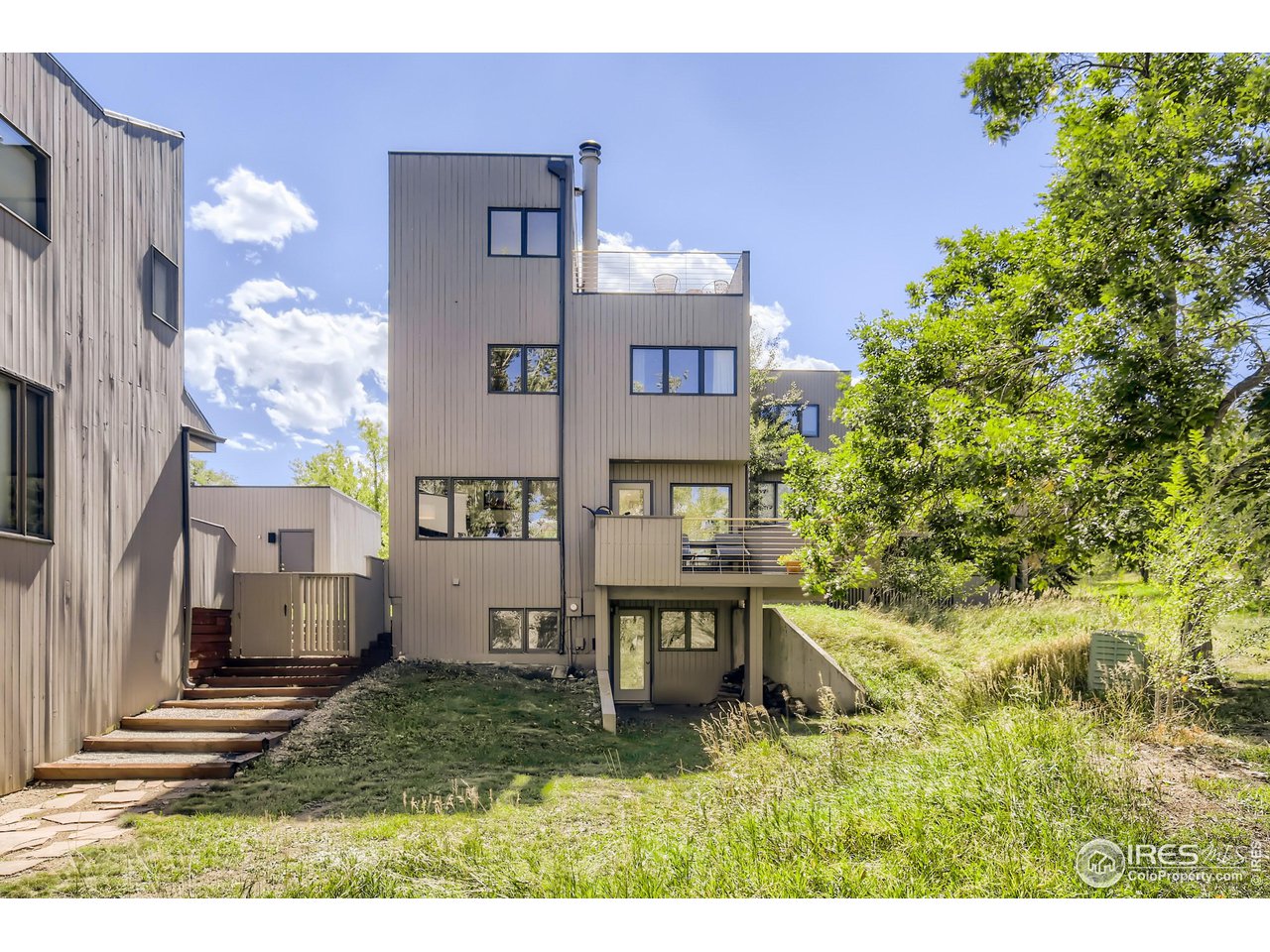 365 Quail Circle Boulder, CO 80304 - Photo 28 of 29 a aerial view of a house with a yard