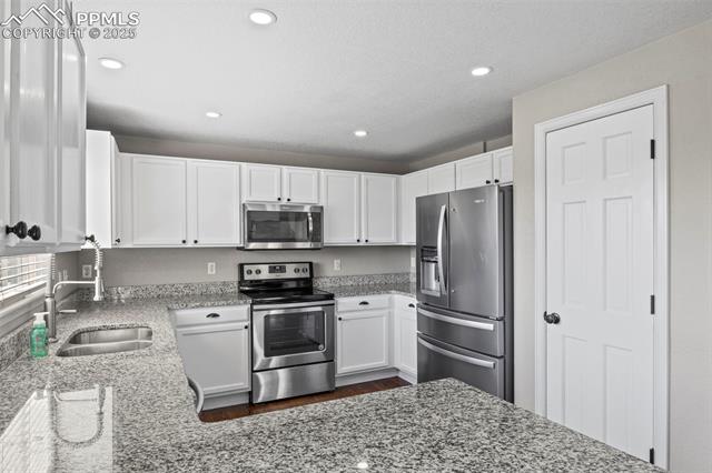 8669 Tibbs Road Peyton, CO 80831 - Photo 13 of 49 Gallery Image 13