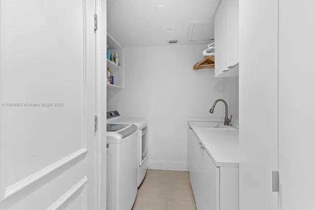 a bathroom with a sink and mirror