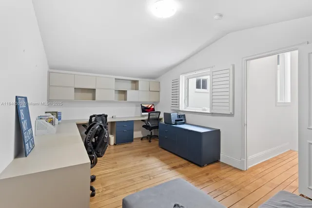 a bed room with furniture and a window