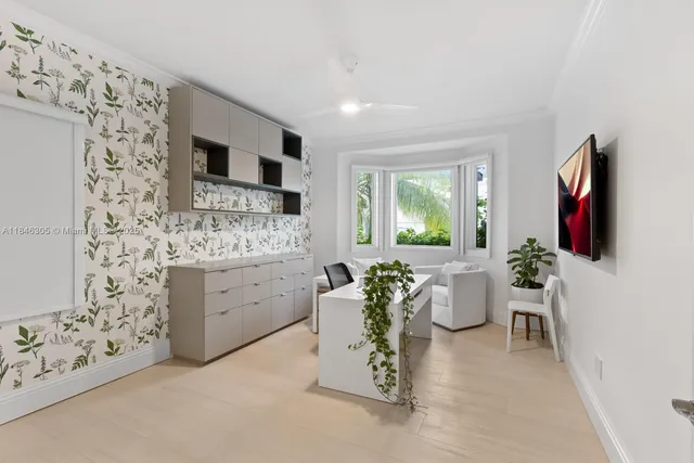 a view of a house with swimming pool and sitting area
