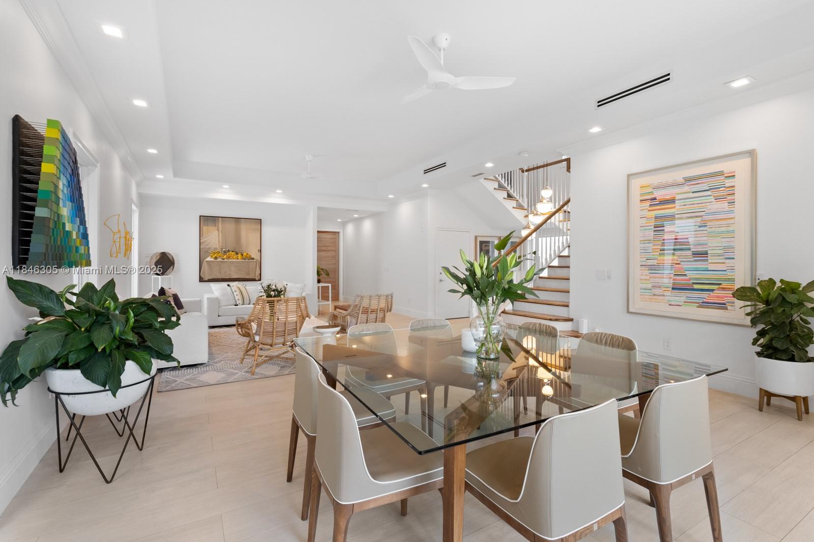 5 Coconut Lane Key Biscayne, FL 33149 - Photo 4 of 41 a view of a dining room with furniture window and wooden floor