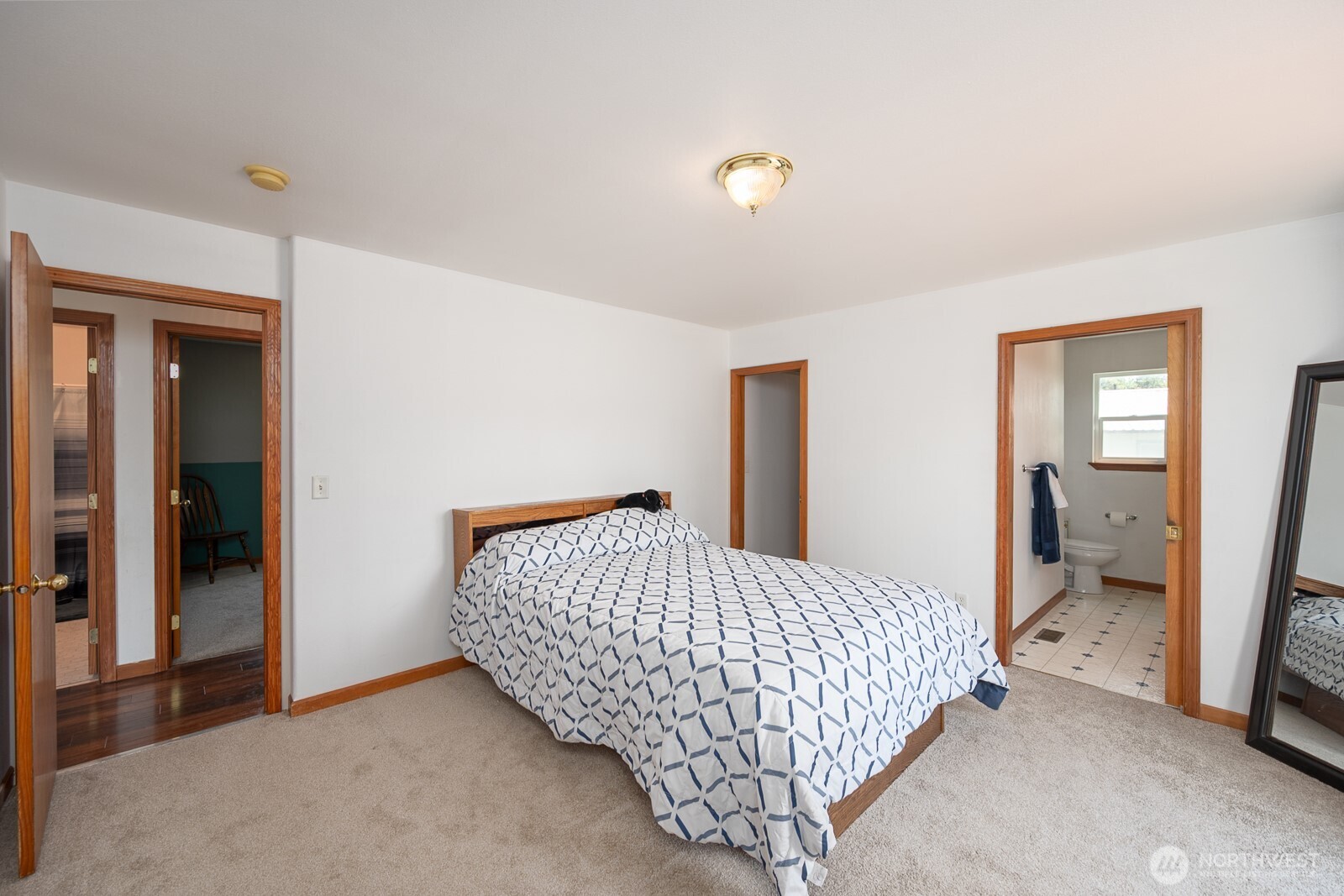 2207 West Depot Springs Road Spangle, WA 99031 - Photo 12 of 26 a bedroom with bed and wooden floor