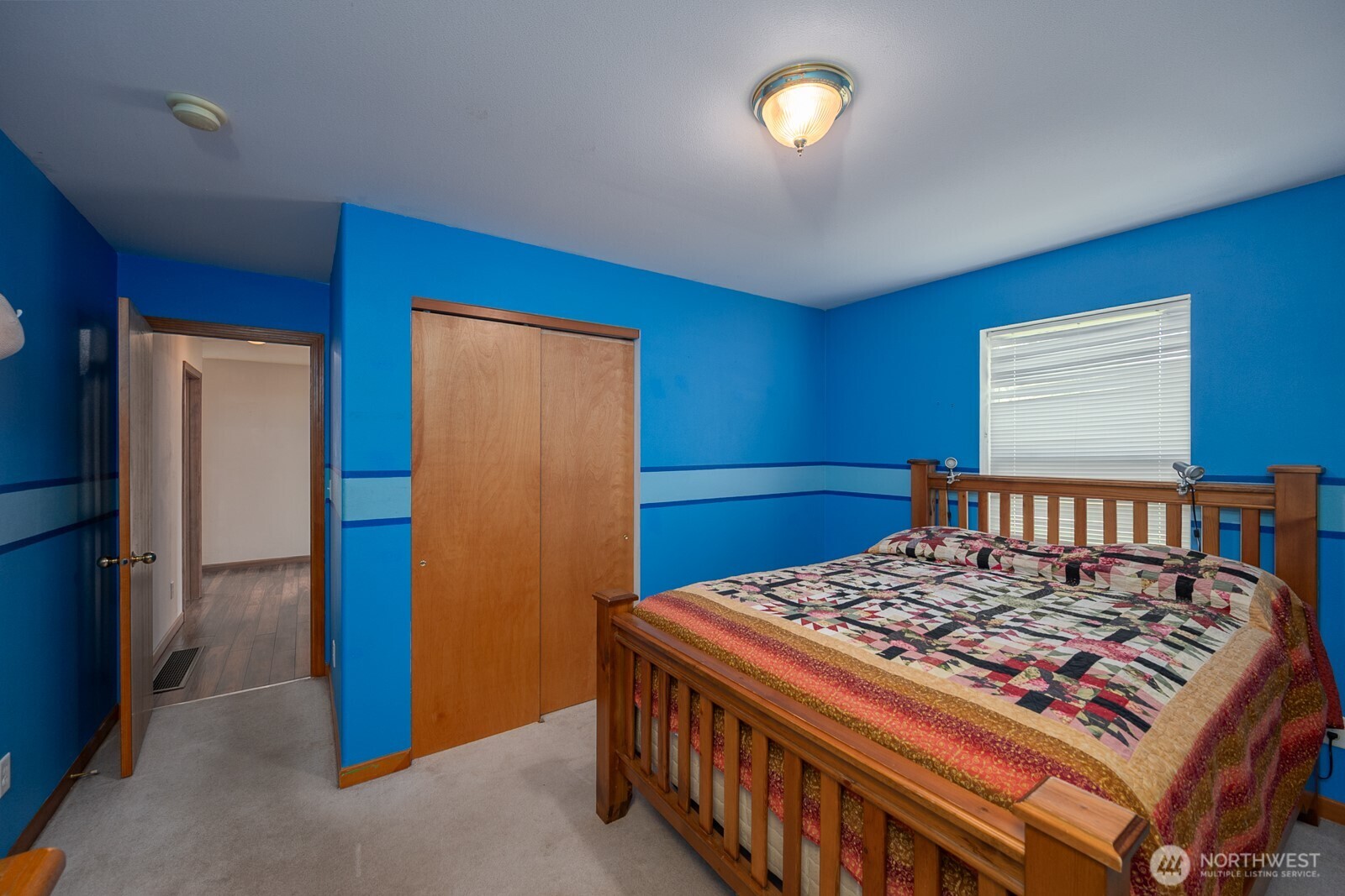 2207 West Depot Springs Road Spangle, WA 99031 - Photo 16 of 26 a bedroom with a bed and a window