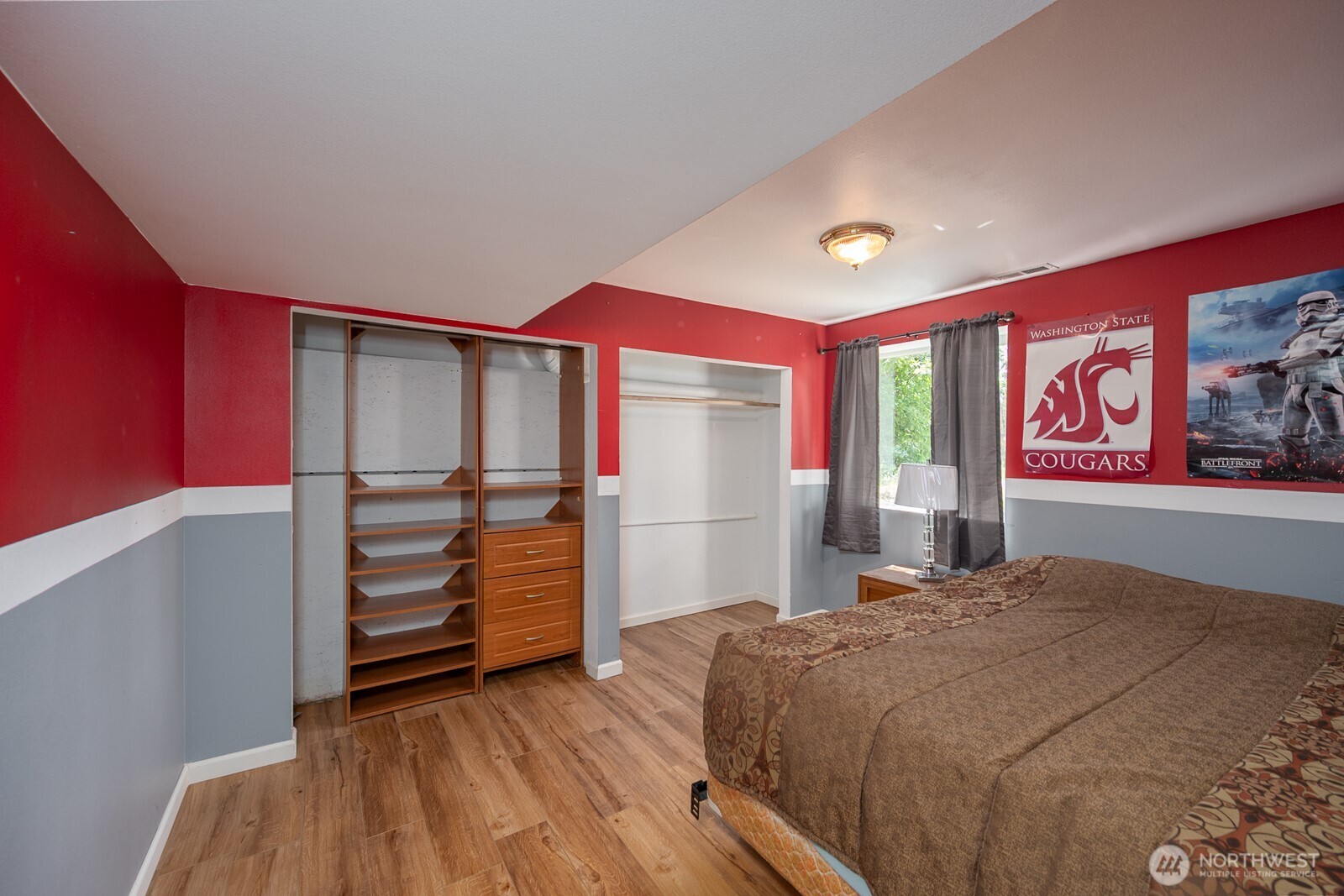 2207 West Depot Springs Road Spangle, WA 99031 - Photo 19 of 26 a bedroom with a bed and a walk in closet
