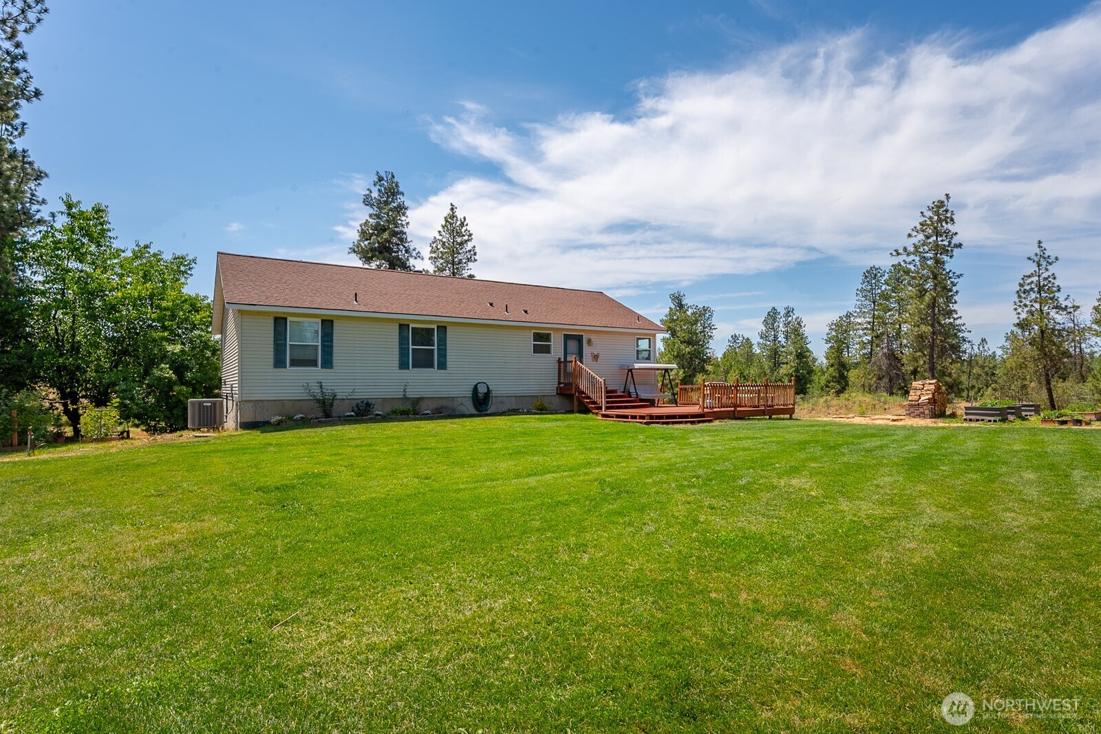 2207 West Depot Springs Road Spangle, WA 99031 - Photo 7 of 26 a view of a house with a big yard