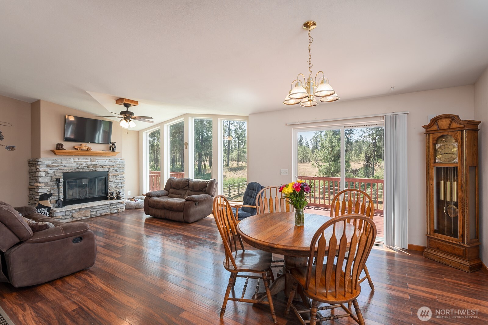 2207 West Depot Springs Road Spangle, WA 99031 - Photo 10 of 26 a view of a livingroom with furniture window and wooden floor