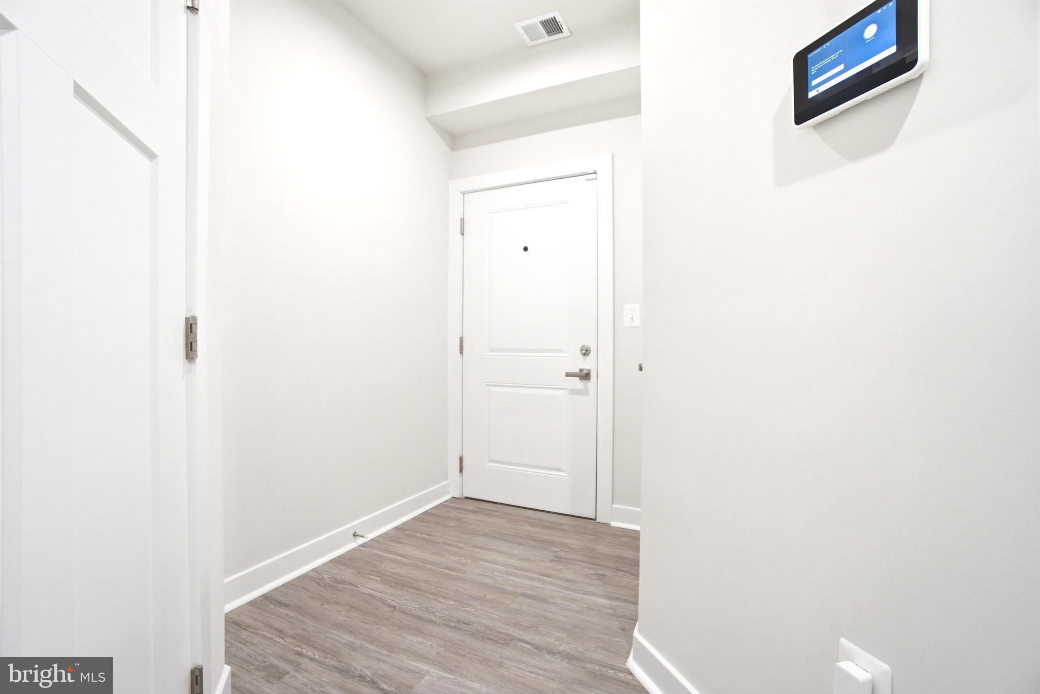10020 Ruffian Way, Unit A Laurel, MD 20723 - Photo 25 of 36 a view of a hallway
