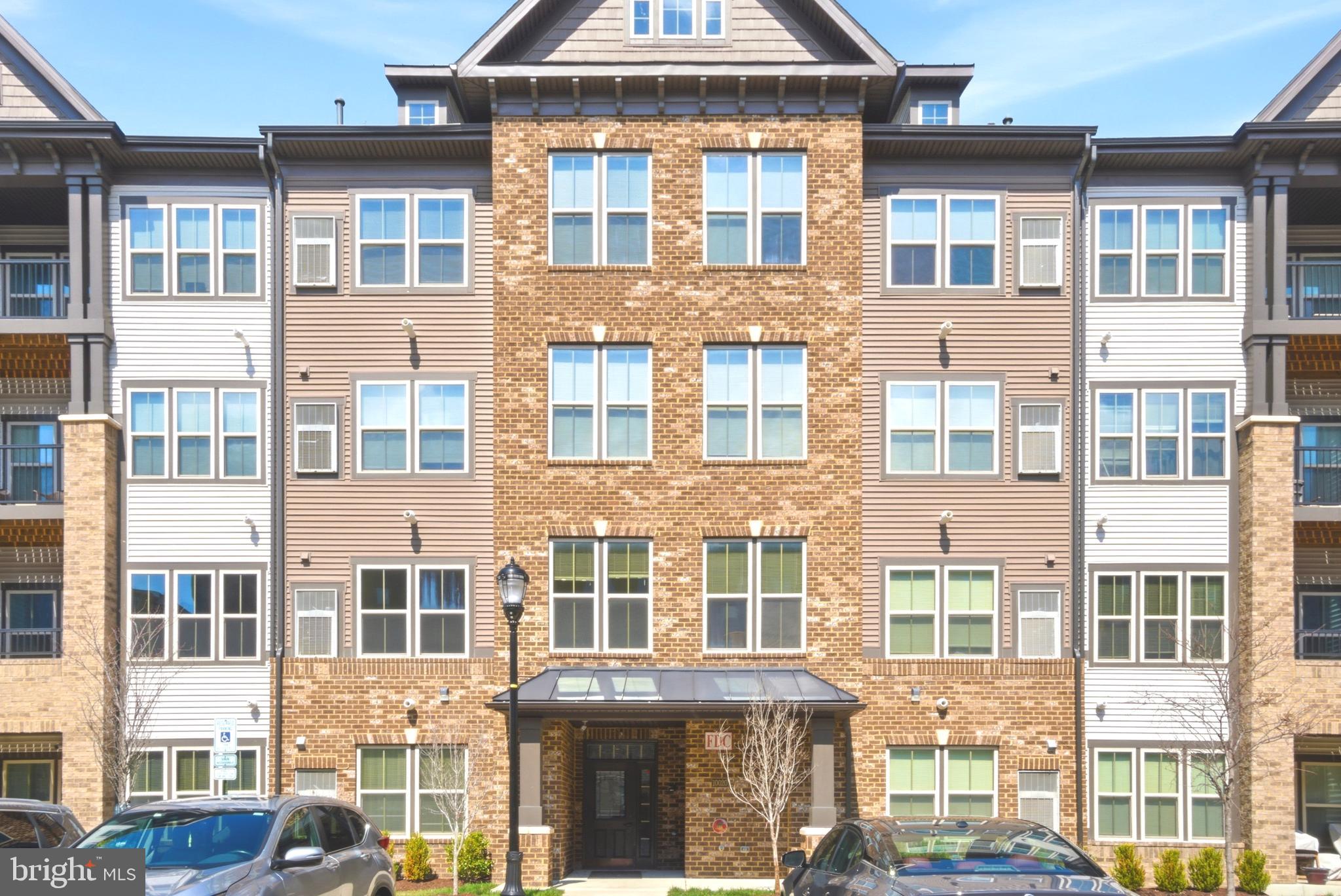 10020 Ruffian Way, Unit A Laurel, MD 20723 - Photo 31 of 36 a front view of a residential apartment building