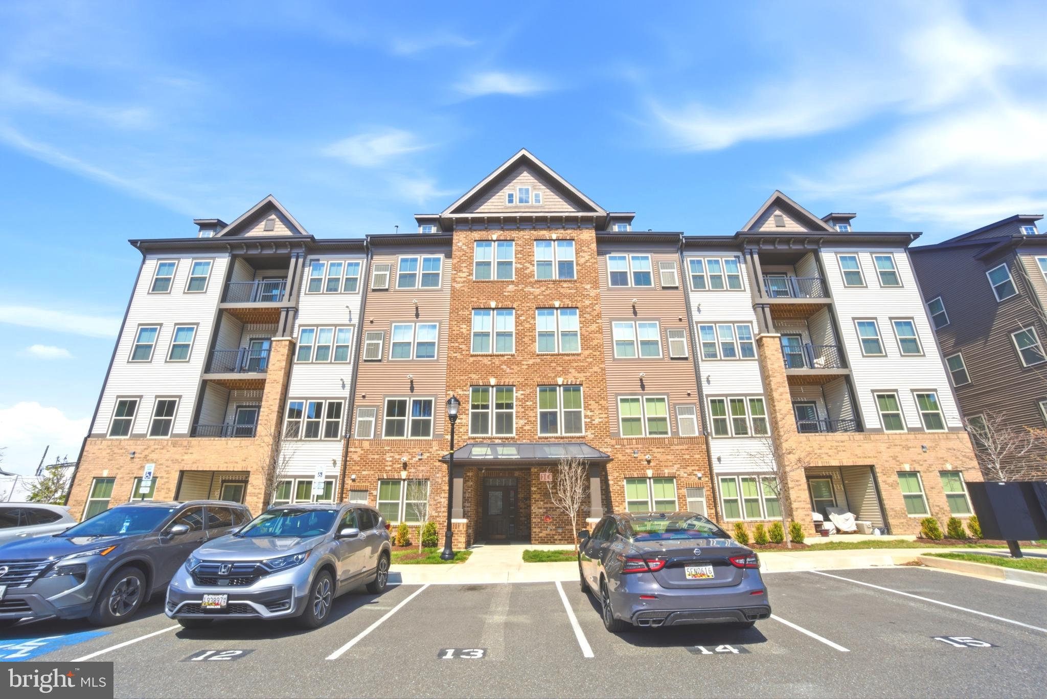 10020 Ruffian Way, Unit A Laurel, MD 20723 - Photo 32 of 36 a car parked in front of a building