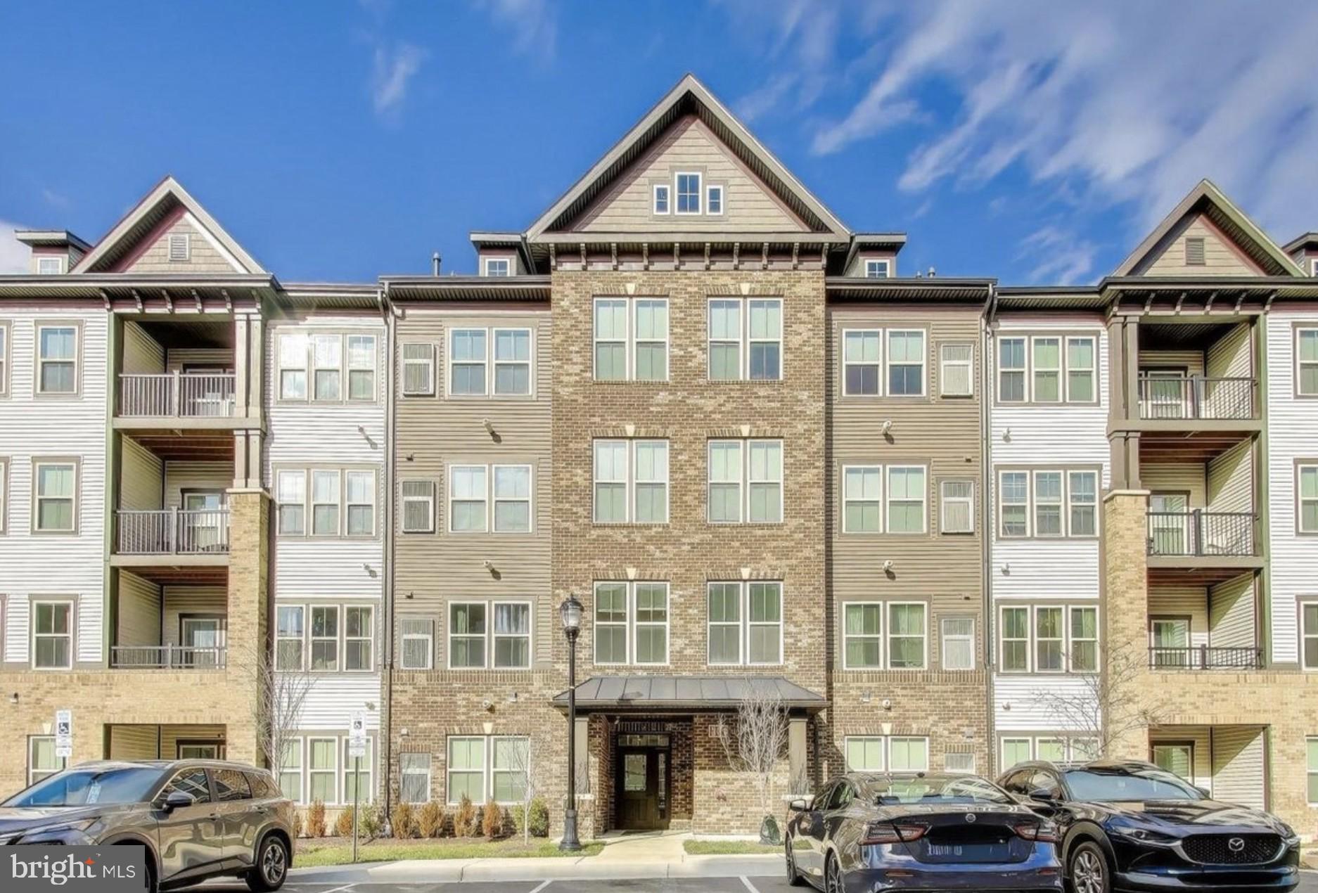 10020 Ruffian Way, Unit A Laurel, MD 20723 - Photo 35 of 36 a view of a car park in front of a building